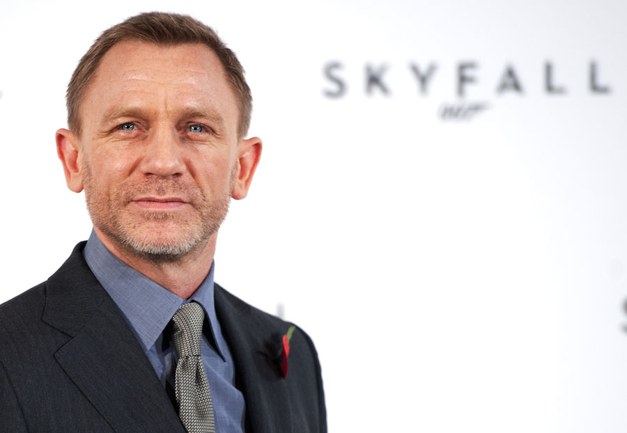 British actor Daniel Craig poses for photographers at a photocall to announce the start of production of the 23rd film in the James Bond series; 'Skyfall', in central London on November 3, 2011. The film sees Craig return to the role in his third outing as the spy hero and will be directed by Academy Award winner Sam Mendes.  Production begins on November 7 with worldwide release scheduled for October 26, 2012. AFP PHOTO / LEON NEAL
