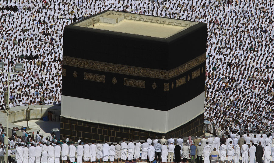 Tens of thousands of Muslim pilgrims pray inside the Grand Mosque, in Mecca, Saudi Arabia, Friday, Nov. 4, 2011. The annual Islamic pilgrimage draws three million visitors each year, making it the largest yearly gathering of people in the world. The Hajj will begin on November 5. (AP Photo/Hassan Ammar)