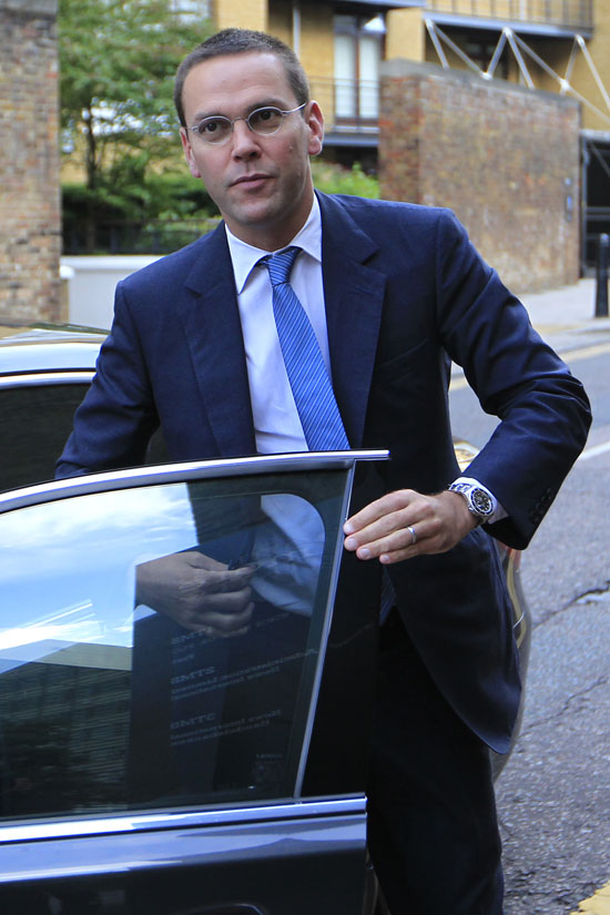 FILE - In this July 19, 2011 file photo, chief executive of News Corporation for Europe and Asia, James Murdoch, arrives at the News International headquarters in London. News International executive James Murdoch resigned as a director of the companies that publish The Sun and The Times of London newspapers, the company confirmed Wednesday, Nov. 23, 2011. (AP Photo/Sang Tan, file)