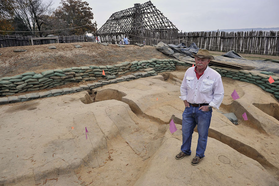 Dr. William Kelso, Director of archeology for Association for the Preservation of Virginia Antiquities (APVA) stands on November 22, 2011 at the exact place where Pocahontas, the favored daughter of the Algonquian chief Powhatan, was standing during her wedding to tobacco entrepreneur John Rolfe, at the site of the recently discovered church of the first British settlement in America at Jamestown, Virginia. The 17th century wedding of Pocahontas and John Rolfe that temporarily brought peace between settlers and Native Americans, may have taken place in the oldest known Protestant church in the United States.     AFP PHOTO/MLADEN ANTONOV