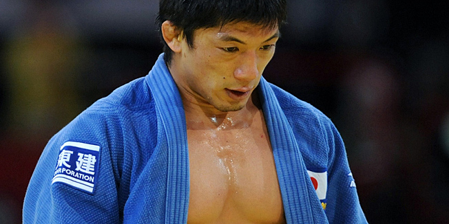 (FILES) This file photo taken on February 7, 2009 shows Japans Masato Uchishiba looking down during his men's final round 66 kg category bout at the Paris judo tournament. Japan's retired double Olympic judo gold medallist Masato Uchishiba was arrested on December 6, 2011 on suspicion of raping a teenage girl at a hotel in Tokyo, police said. Uchishiba, 33, who won the 66kg title at the 2004 and 2008 Olympics, has denied the charge, saying he had the sex 