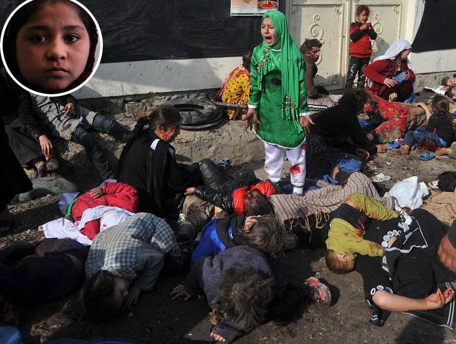 TO GO WITH Afghanistan-unrest-religion-girl,FOCUS by Katherine Haddon and Mushtaq Mojaddidi(FILES) This file picture taken on December 6, 2011 shows 12-year-old Afghan girl Tarana Akbari (C) wearing a bright green robe as she stands among bodies and injured people shortly after a bomb exploded outside a riverside shrine  in Kabul during the celebrations of the Shiite holy day of Ashura.  After a suicide bomber ripped apart the lives of Tarana's family and scores of others, the image of her standing horrified in the blood-stained outfit came for many to symbolise Afghanistan's violent present and its uncertain future.  AFP PHOTO/FILES/Massoud HOSSAINI