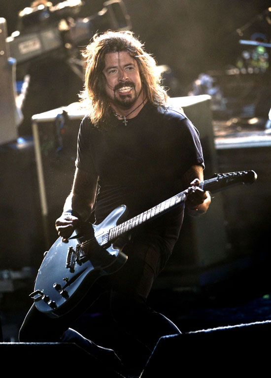 FILE - In this June 5, 2011 file photo, Dave Grohl, of the Foo Fighters, performs at the MTV Movie Awards in Los Angeles. The Foo Fighters were nominated for six Grammy Awards on Wednesday, Nov. 30, 2011.  The awards will be held on Feb. 12. (AP Photo/Matt Sayles, file)