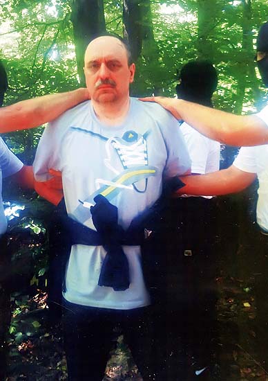 RESTRICTED TO EDITORIAL USE - MANDATORY CREDIT POLITIKA NEWSPAPER - NO MARKETING NO ADVERTISING CAMPAIGNS - DISTRIBUTED AS A SERVICE TO CLIENTSPicture provided by the Politika newspaper shows Goran Hadzic, the last fugitive wanted by the UN war crimes court in The Hague, during his arrest at the Fruska Gora mountain north of capital Belgrade, on July 20, 2011. The top official and prosecutor of the UN war crimes court for the former Yugoslavia hailed the arrest Wednesday of its last fugitive Goran Hadzic as a step bringing the court closer to completing its mandate.   AFP PHOTO / POLITIKA NEWSPAPER / HANDOUT