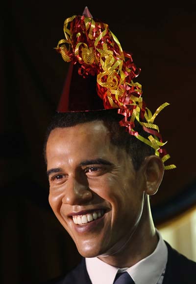 WASHINGTON, DC - AUGUST 04: A wax figure of U.S. President Barack Obama wearing a birthday party hat is displayed on Obama's 50th birthday at Madame Tussauds Wax Museum August 4, 2011 in Washington, DC. On Obama's 50th birthday, the replica Oval Office at Madame Tussauds was decorated with party balloons, streamers and presents, while the figures the Obamas, Bill and Hillary Clinton and Oprah Winfrey were outfitted with party hats and noisemakers. .   Win McNamee/Getty Images/AFP== FOR NEWSPAPERS, INTERNET, TELCOS & TELEVISION USE ONLY ==
