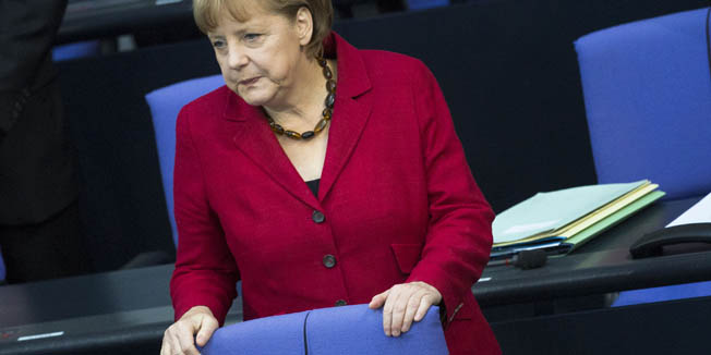German Chancellor Angela Merkel arrives at the German parliament Bundestag in Berlin, Germany, Thursday, May 24, 2012. (AP Photo/Markus Schreiber)