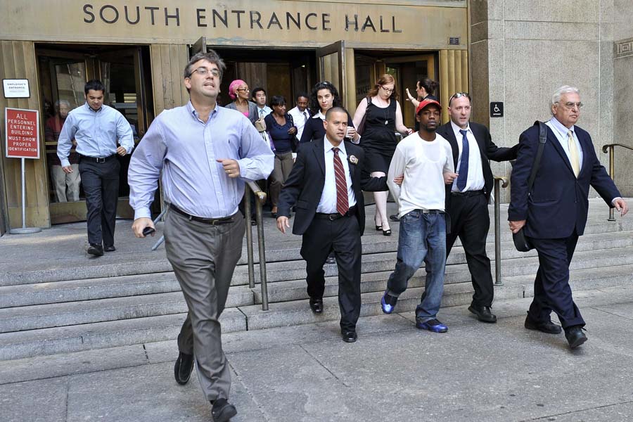 People evacuate the courthouse after an earthquake was felt in New York on August 23, 2011 causing buildings to be evacuated. One of the strongest earthquakes to strike the US east coast in decades rattled offices in downtown Washington and caused panicked evacuations from skyscrapers as far away as New York. The Pentagon, the US Capitol and Union Station in the nation's capital were all evacuated after the 5.9-magnitude quake, which was shallow with its epicenter only 0.6 miles (one kilometer) underground.     AFP PHOTO/Nicholas KAMM