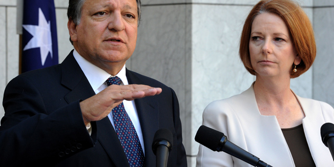 Australia Prime Minister Julia Gillard (R) looks on as European Commission President Jose Manuel Barroso (L) gestures during their joint press conference at Parliament House in Canberra on September 5, 2011. Barroso, who is on his first visit to Australia, said he did not expect Europe to slide into recession, calling the European Union and the euro 