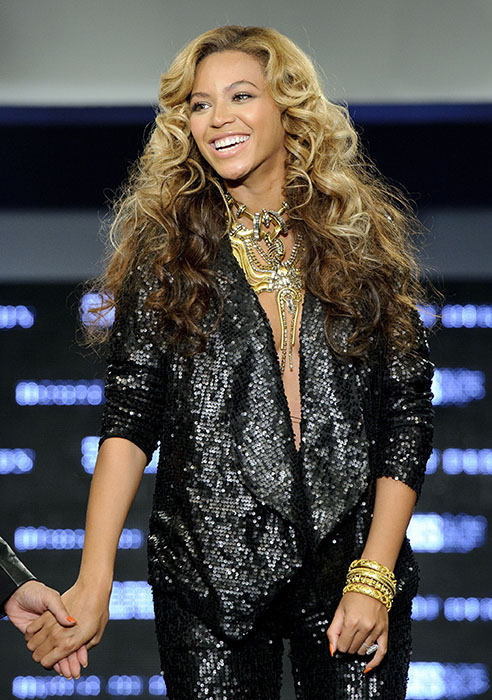 U.S singer Beyonce Knowles launches her collection House of Dereon in collaboration with U.S designer Tina Knowles, featuring both the Autum-Winter and Summer 2011 collections, in London, during London Fashion week, Saturday, Sept. 17, 2011. (AP Photo/Jonathan Short)