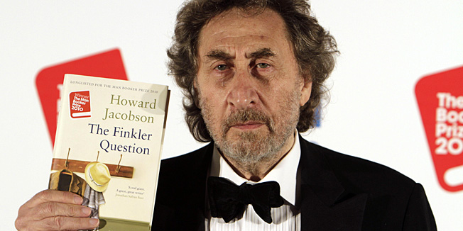 British author Howard Jacobson, displays his book  'The Finkler Question', winner of  the Man Booker Prize for Fiction 2010, following the announcement at central London's Guildhall, late Tuesday Oct. 12, 2010. British writer Howard Jacobson won the prestigious Booker Prize Tuesday with his philosophical comedy 