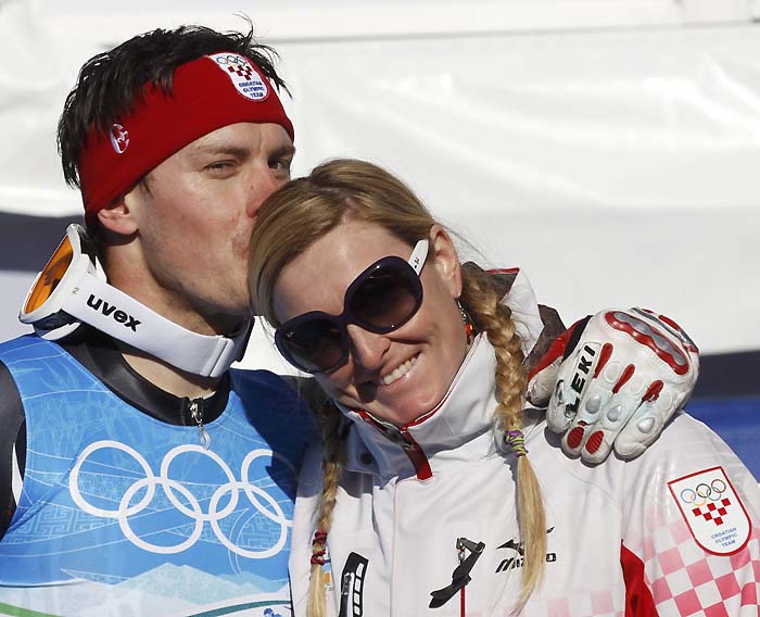 Croatia's silver medalist Ivica Kostelic kisses his sister Janica after the men's Alpine Skiing Super Combined event at the Vancouver 2010 Winter Olympics in Whistler, British Columbia, February 21, 2010. REUTERS/Leonhard Foeger (CANADA)