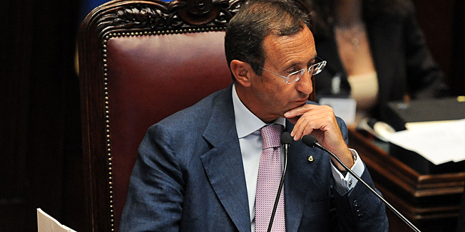 Italy's lower house speaker Gianfranco Fini looks on before Italian lawmakers rejected a no-confidence motion against a junior minister of the government of Prime Minister at Italy's Chamber of Deputies, on August 4, 2010.  Italian lawmakers on Wednesday rejected a no-confidence motion against a junior minister of the government of Prime Minister Silvio Berlusconi, seemingly putting off an early election scenario. AFP PHOTO / ANDREAS SOLARO