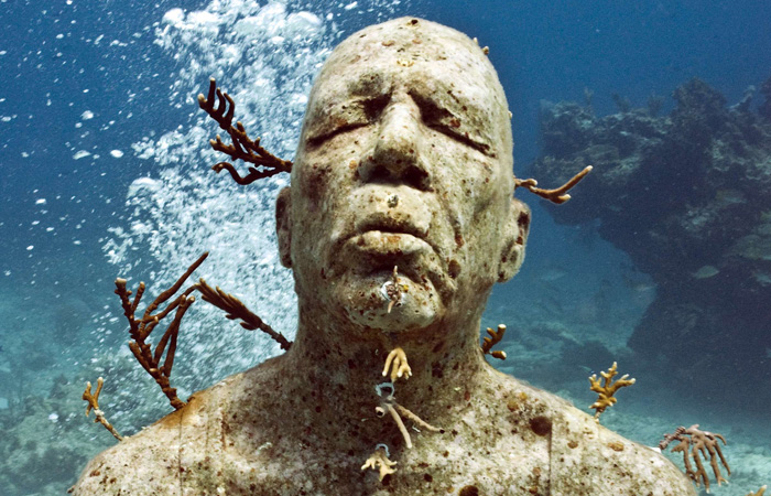 TO GO WITH AFP STORY BY SOPHIE NICHOLSON - Handout undated photo of one of the 400 human figures that constitute the exhibit of underwater sculpture called 