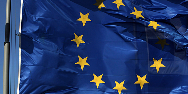 An EU and a Greek flag fly in front of ancient Parthenon temple, in Athens, Sunday, June 17, 2012 as Greeks vote in the most crucial elections in decades. Greece voted Sunday amid global fears that victory by parties that have vowed to cancel the country's international bailout agreements and accompanying austerity measures could undermine the European Union's joint currency and pitch the world's major economies into another sharp downturn. (AP Photo/Petros Giannakouris)