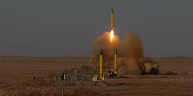 In this picture released by the Iranian Fars News Agency, asurface-to-surface missile is launched during the Iranian Revolutionary Guards maneuver in an undisclosed location in Iran, Tuesday, July 3, 2012. Iran's powerful Revolutionary Guards test fired several ballistic missiles on Tuesday, including a long-range variety capable of hitting U.S. bases in the region as well as Israel, Iranian media reported. (AP Photo/Fars News Agency, Hamed Jafarnejad)THE ASSOCIATED PRESS HAS NO WAY OF INDEPENDENTLY VERIFYING THE CONTENT, LOCATION OR DATE OF THIS IMAGE. 