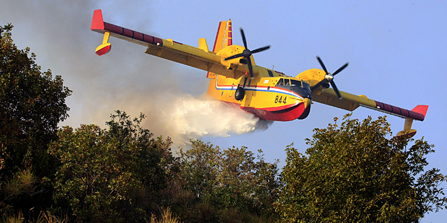 Labin, Rabac, 050812.Pozar izmedju Labina i Rapca gasilo je tridesetak vatrogasaca, kanader i airtraktor. Izgorjelo je desetak hektara niskog raslinja i stabala.Foto: Goran Sebelic / CROPIX                              