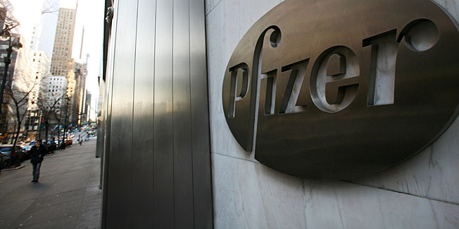FILE - A Jan. 25, 2009 file photo, shows Pfizer's world headquarters  in New York. Pfizer Inc. reported Tuesday July 31, 2012,  its second-quarter net income jumped 25 percent as sharply lower production, marketing and restructuring costs more than offset a plunge in revenue from cholesterol fighter Lipitor caused by generic competition.   (AP Photo/Mark Lennihan, File)