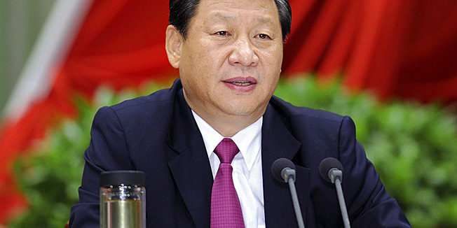 In this photo taken Sept. 1, 2012 and released by China's Xinhua News Agency, Chinese Vice President Xi Jinping addresses the opening ceremony of the autumn semester of the Party School of the Communist Party of China in Beijing. Chinese micro-bloggers and overseas websites have come up with all kinds of creative speculation as to why President-in-waiting Xi has gone unseen for more than a week. (AP Photo/Xinhua, Li Tao) NO SALES