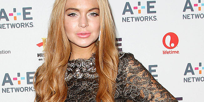 In this May 9, 2012 photo shows actress Lindsay Lohan at the A&E Networks 2012 Upfront at Lincoln Center in New York. Lohan will star as Elizabeth Taylor in the upcoming Lifetime TV movie 