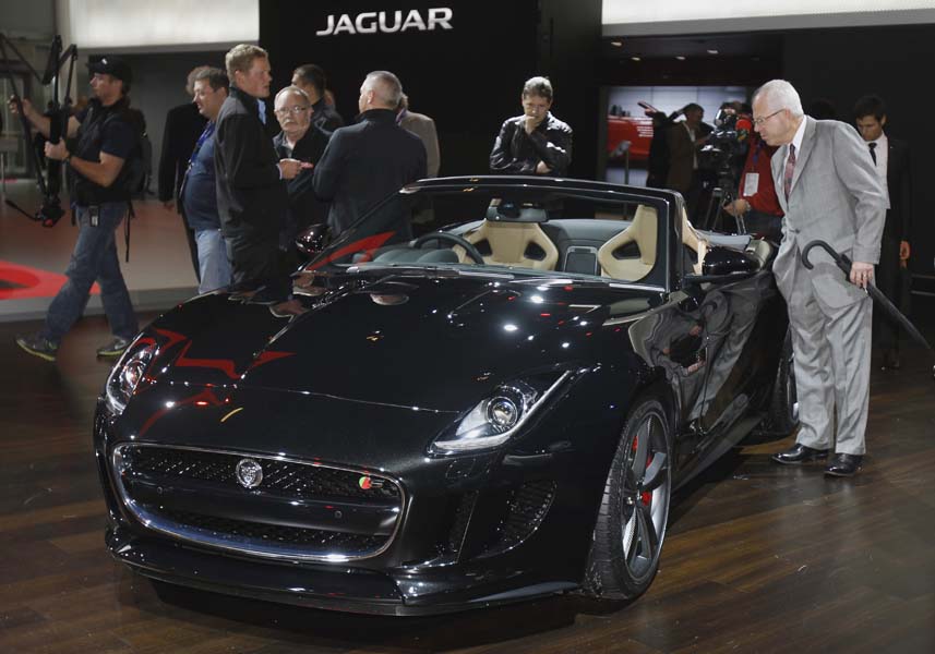The new Jaguar F-Type is on display during the media day at the Paris Auto Show, France, Thursday, Sept. 27, 2012. The Paris Auto Show will open its gates to the public from Sept. 29 to Oct. 14. (AP Photo/Remy de la Mauviniere)