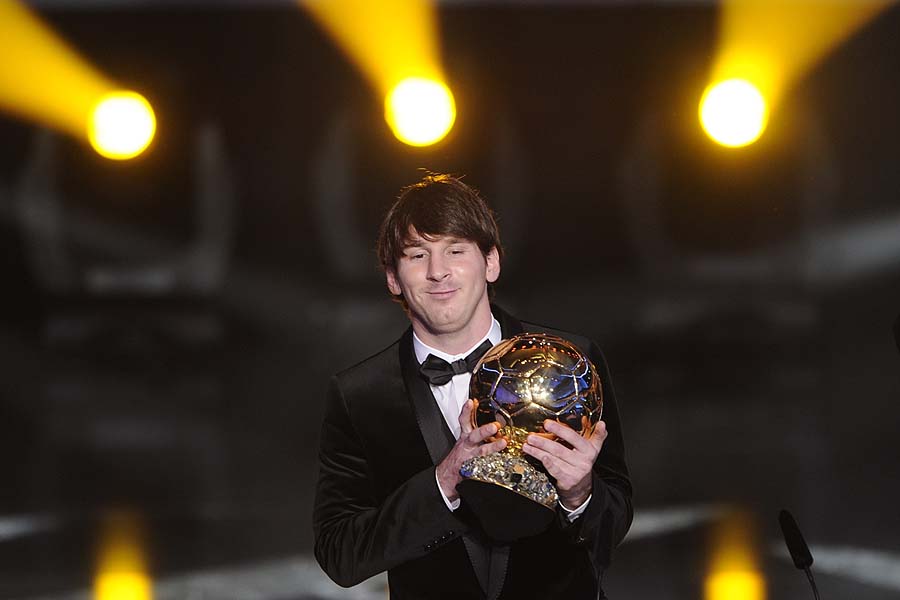 Argentina's Lionel Messi is awarded the FIFA Ballon d'Or on January 10, 2011 at the Kongresshaus during the FIFA Ballon d'Or ceremony in Zurich. The three finalists for the 2011 Ballon d'Or are Spain's Xavi Hernandez, Spain's Andres Iniesta and Argentina's Lionel Messi who all play for Barcelona. AFP PHOTO / FABRICE COFFRINI