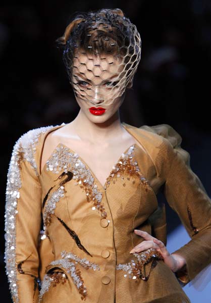 A model wears a creation of British fashion designer John Galliano for Dior's Haute Couture Spring Summer 2011 fashion collection presented in Paris, Monday, Jan. 24, 2011. (AP Photo/ Francois Mori)