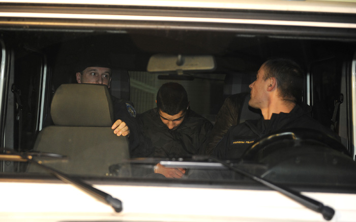 Zadar, 100311.Danas u 17 sati na Zupanijski sud u Zadru priveden je Dino Sakic (20) osumljicen za ubojstvo svoje majke Divne Moric (40).Foto: Andrija Lucic / Cropix