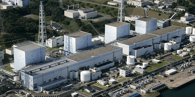 FILE This October 2008  file photo shows the Fukushima No. 1  power plant of Tokyo Electric Power Co. at Okuma, Fukushima prefecture, northern Japan. The owner of Japan's now-hobbled nuclear power plant dismissed scientific evidence that a powerful earthquake and giant tsunami could strike the facility, concluding instead that its reactors would stay dry even if battered by the highest waves the utility envisioned, according to an Associated Press investigation. (AP Photo/Kyodo News, File) JAPAN OUT, MANDATORY CREDIT, NO SALES IN CHINA, HONG  KONG, JAPAN, SOUTH KOREA AND FRANCE