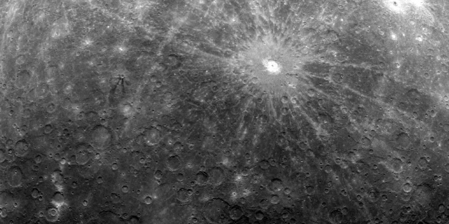 This image provided by NASA is the first ever obtained from a spacecraft in orbit about the Solar System's innermost planet, Mercury. The image was captured early this morning, at 5:20 a.m. EDT,Tuesday March 29, 2011. The dominant rayed crater in the upper portion of the image is Debussy. The bottom portion of this image is near Mercury's south pole and includes a region of Mercury's surface not previously seen by spacecraft. On March 17, 2011 (March 18, 2011, UTC), MESSENGER became the first spacecraft to orbit the planet Mercury.  (AP Photo/NASA)