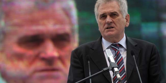 Tomislav Nikolic, Serbian Progress Party leader, speaks during a opposition rally on April 16, 2011, in Belgrade. Tens of thousands of demonstrators gathered in Belgrade for the climax of a series of anti-government protests aimed at forcing early elections. The planned mass rally is organized by the opposition nationalist Serbian Progress Party (SNS) which is hoping to cash in on growing public discontent as Serbia struggles with rising prices, inflation and high unemployment.   AFP PHOTO / ALEXA STANKOVIC