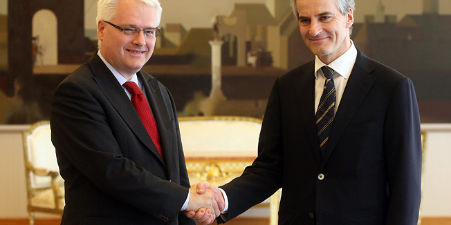 Croatian President Ivo Josipovic, left, shakes hands with Norwegian Foreign Minister Jonas Gahr Store, in Zagreb, Croatia, Wednesday, April 20, 2011. Store is on official one-day visit to Croatia. (AP Photo)
