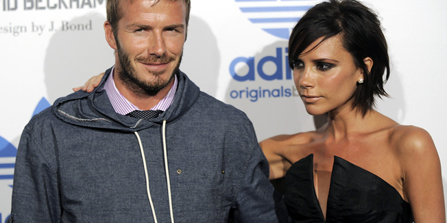 FILE - In this Sept, 30, 2009 photo, David Beckham, left, and his wife Victoria arrive at an event to celebrate the launch of the Adidas Originals by Originals David Beckham clothing line designed by James Bond,  in Los Angeles.   David Beckham and wife Victoria are expecting their fourth child, and a spokesman said Sunday that the couple has learned that it will be a girl. In January the former England captain announced via Facebook that his wife was due this summer. The pair, who married in 1999, already has three boys: 11-year-old Brooklyn, eight-year-old Romeo, and five-year-old Cruz.  (AP Photo/Chris Pizzello)