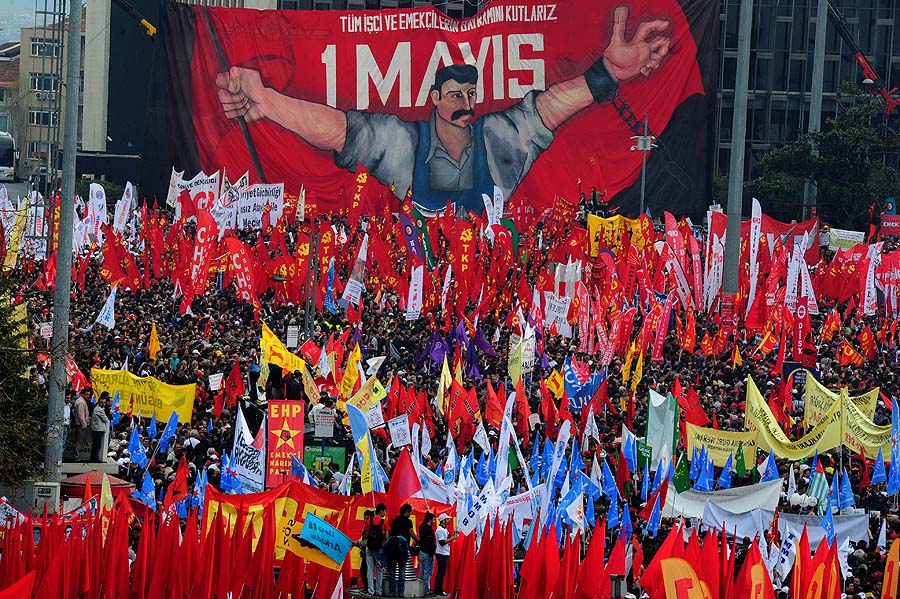 Turkish protestors gather at Taksim square during a May Day rally in central Istanbul, on May 1, 2011. Tens of thousands of workers gathered on an iconic square in the heart of Turkey's biggest city Istanbul Sunday to celebrate May Day at the site where dozens were killed at a rally 34 years ago. AFP PHOTO / MUSTAFA OZER