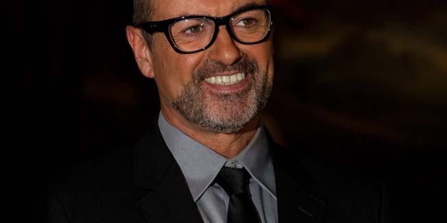 British singer George Michael attends a press conference at the Royal Opera House, central London on May 11, 2011.  The event was to announce his 