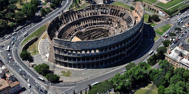 An aerial view of Rome shwing the Collisseum on May 11, 2011.  Thousands of alarmed Italians are fleeing the capital amid rumours that a seismologist predicted that a devastating earthquake will strike the Eternal City. AFP PHOTO / STR