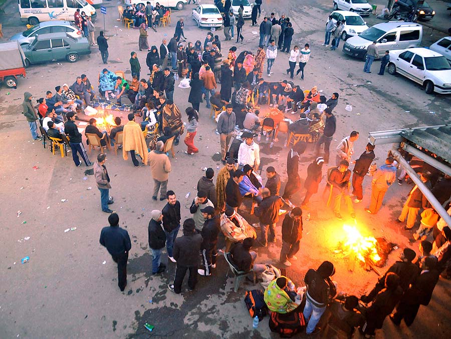 Residents stand early on May 20, 2011 in the streets of Simav in Kutahya province, about 310 kms (190 miles) west of the capital Ankara, after an earthquake measuring 5.9 on the open-ended Richter scale that hit northwest Turkey late on May 19, killing two people and injuring 79. The epicenter of the quake was in Simav.         AFP PHOTO / ANATOLIA NEWS AGENCY / SONER KILINC           - TURKEY OUT -