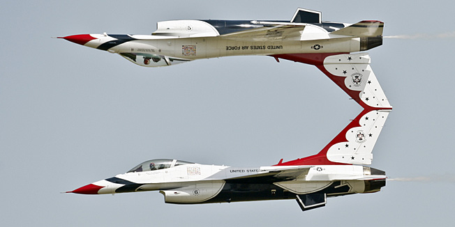 The US Air Force Thunderbirds F16 demonstration squadron performs in Mihail Kogalniceanu, eastern Romania, Wednesday, June 8, 2011. The southern Romanian air base of Deveselu will be one of the stations for AEGIS ballistic missile defense technology, part of the US missile shield in Europe.(AP Photo/Vadim Ghirda)