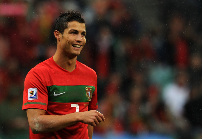 Portugal's striker Cristiano Ronaldo reacts during the Group G first round 2010 World Cup football match North Korea versus Portugal on June 21, 2010 at Green Point stadium in Cape Town. NO PUSH TO MOBILE / MOBILE USE SOLELY WITHIN EDITORIAL ARTICLE - AFP PHOTO / FRANCISCO LEONG