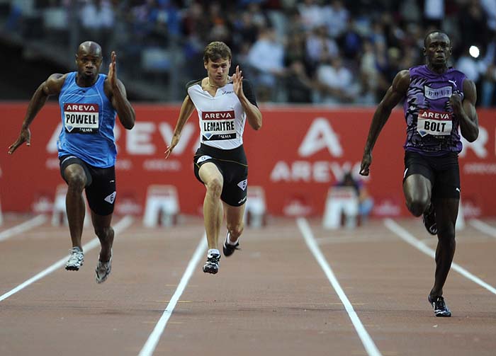 (From L) Jamaican Asafa Powell, French Christophe Lemaitre and  Jamaican Usain Bolt compete in the men's 100m event of the Paris IAAF Diamond League meeting on July 16, 2010 at the Stade de France in Saint-Denis, near Paris.   AFP PHOTO / BORIS HORVAT