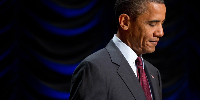 US President Barack Obama pauses while speaking before signing the Dodd-Frank Wall Street Reform and Consumer Protection Act at the Ronald Reagan Building in Washington, DC, July 21, 2010. AFP PHOTO / Saul LOEB