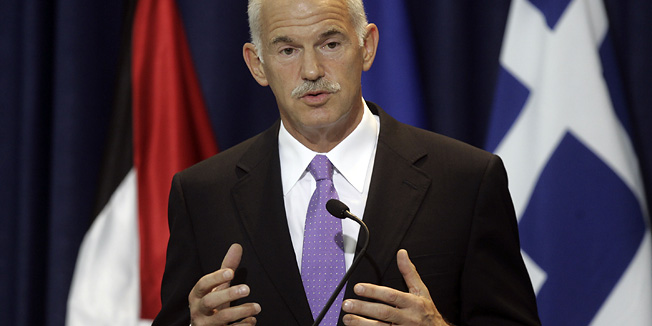 Greek Prime Minister George Papandreou talks during a press conference with Palestinian President Mahmoud Abbas, not pictured, in the West Bank city of Ramallah, Thursday, July 22, 2010. Papandreou is making the first visit by a Greek prime minister to Israel and the Palestinian Territories in three decades. (AP Photo/Majdi Mohammed)