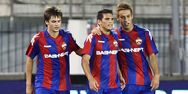 Georgi Schennikov, left, Mark Gonzales, center, and Keisuke Honda of CSKA Moscow celebrate a goal against Anorthosis Famagusta during their Europa League third qualifying round, second leg soccer match at Antonis Papadopoulos stadium in Larnaca, Cyprus, Tuesday, Aug. 24, 2010. CSK Moscow won the match 2-0. (AP Photo)