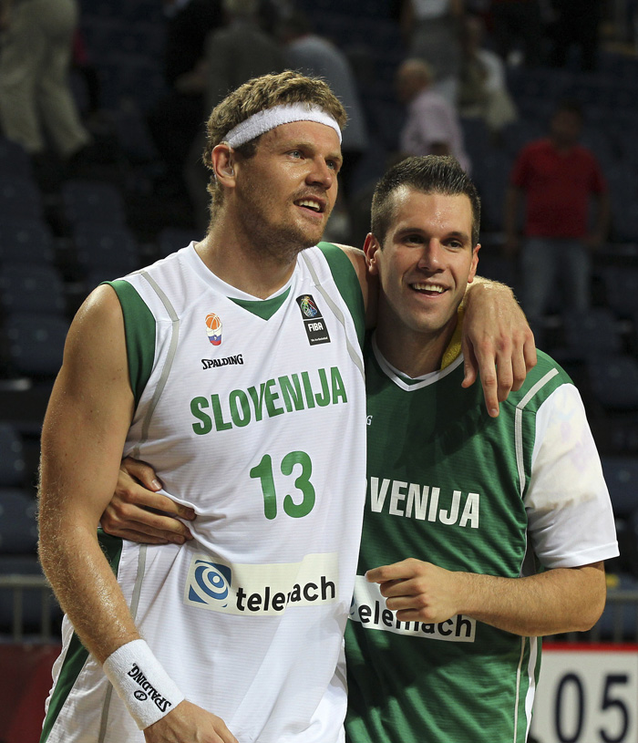 Slovenia's players smile after a World Basketball Championship round of 16 match against Australia at the Sinan Erdem stadium in Istanbul, Turkey, Sunday, Sept. 5, 2010. Slovenia won 87-58. (AP Photo/Thanassis Stavrakis)