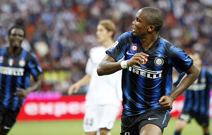 Inter Milan forward Samuel Eto'o, right, of Cameroon, celebrates after scoring during the Serie A soccer match between Inter Milan and Udinese at the San Siro stadium in Milan, Italy, Saturday, Sept. 11, 2010. (AP Photo/Antonio Calanni)