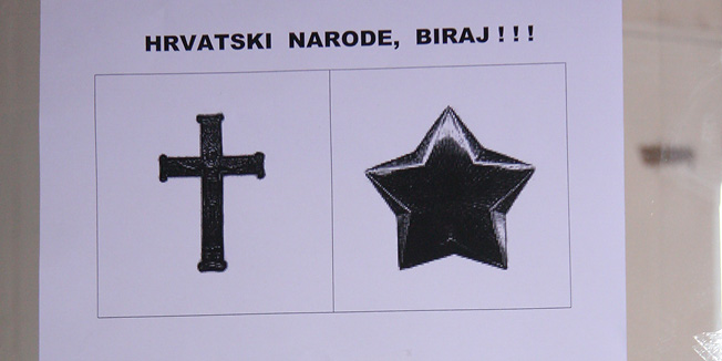 Osijek, 030110.Plakat o Milanu Bandicu i Ivi Josipovicu koje je zaljepljen na ulasku u jedan ugostiteljski objekt u centru Osijeka.Foto: Dorian Horvat / Cropix