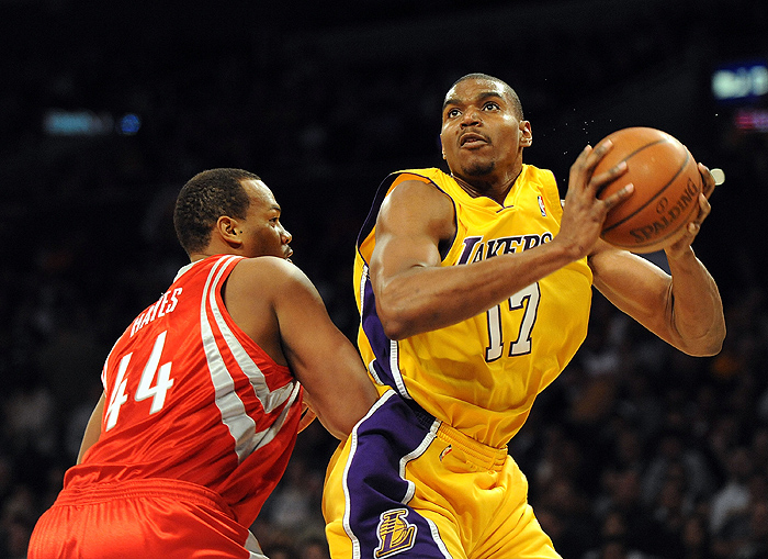 LOS ANGELES, CA - JANUARY 05: Andrew Bynum #17 of the Los Angeles Lakers spins to score on Chuck Hayes #44 of the Houston Rockets during the first half at Staples Center on January 5, 2010 in Los Angeles, California. NOTE TO USER: User expressly acknowledges and agrees that, by downloading and/or using this Photograph, user is consenting to the terms and conditions of the Getty Images License Agreement.   Harry How/Getty Images/AFP== FOR NEWSPAPERS, INTERNET, TELCOS & TELEVISION USE ONLY ==