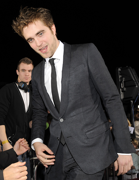 Actor Robert Pattison arrives at The Twilight Saga: New Moon premiere in Westwood, Calif. Monday, Nov. 16, 2009.  (AP Photo/Chris Pizzello)