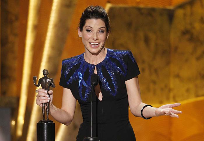Actress Sandra Bullock accepts the award for best female actor in a leading role for 