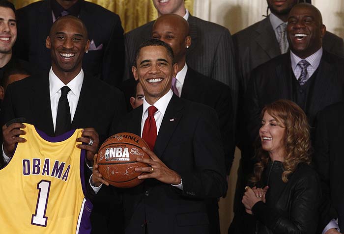U.S. President Barack Obama (C) shares a laugh with Kobe Bryant (L) and Earvin 