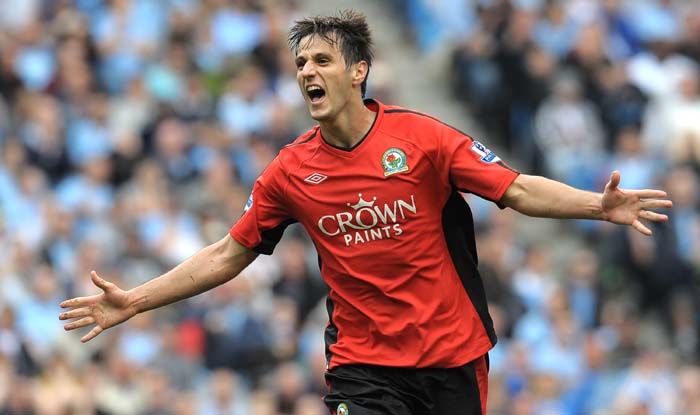 Blackburn Rovers' Croatian forward Nikola Kalinic celebrates after opening the scoring during his team's English Premier League football match against Manchester City at The City of Manchester stadium in Manchester, northwest England, on September 11, 2010. AFP PHOTO/ANDREW YATESFOR  EDITORIAL USE Additional licence required for any commercial/promotional use or use on TV or internet (except identical online version of newspaper) of Premier League/Football League photos. Tel DataCo +44 207 2981656. Do not alter/modify photo